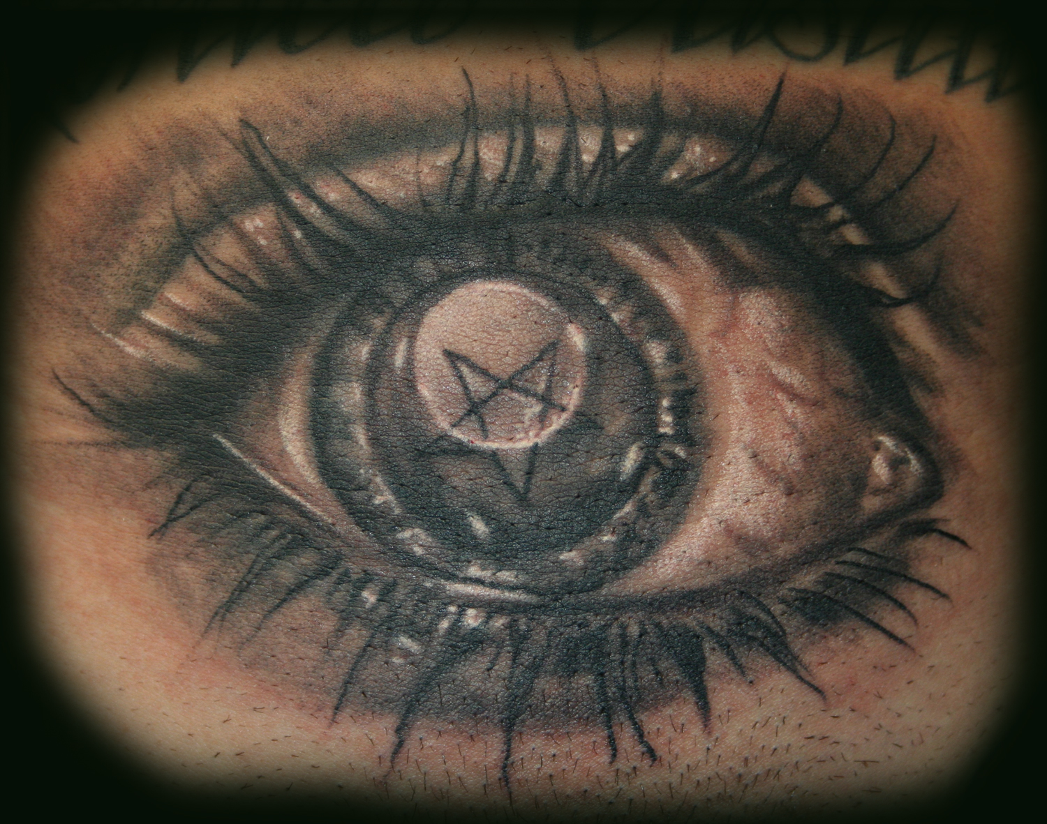 Evil Eye Tattoo by Stevie Monie TattooNOW